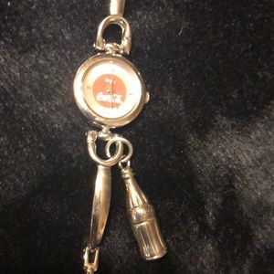 Coca-Cola watch with coke bottle.